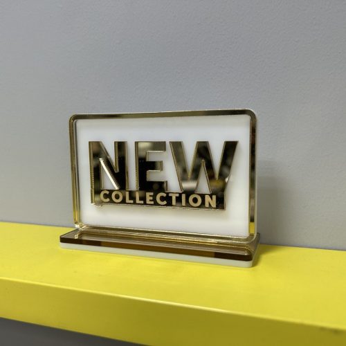 Табличка настольная из оргстекла “NEW collection”